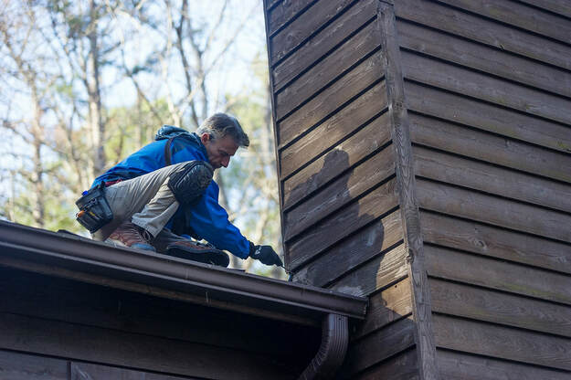 rick conducting a roof and chimney